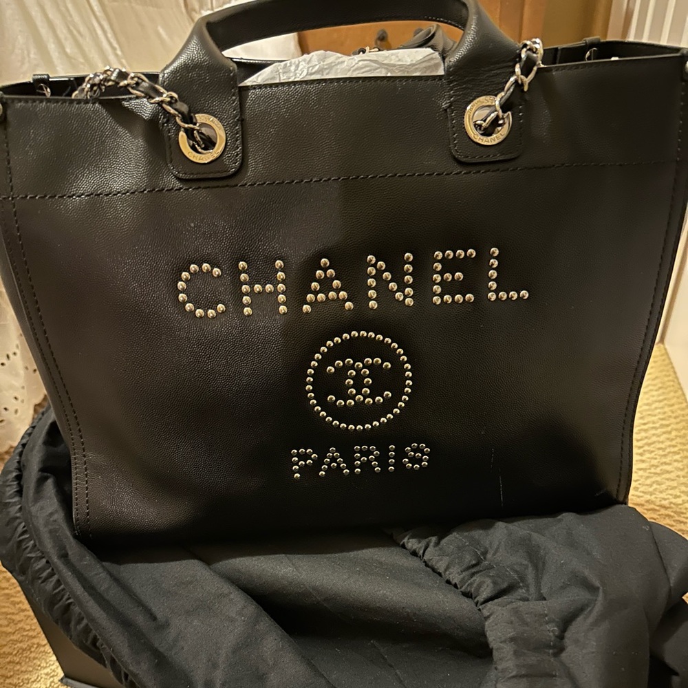 Large Chanel Deauville tote with embossed silver studs in calfskin leather
